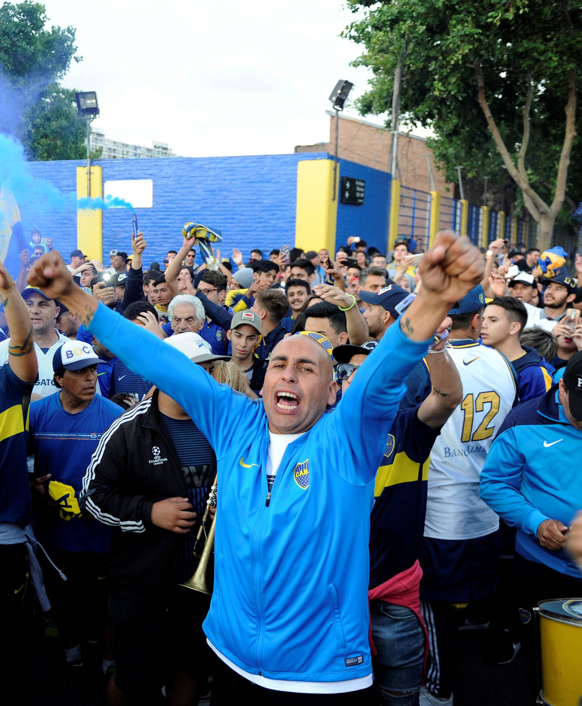 Boca Juniors' fans cheer as their team heads on to Spain to play the Copa Libertadores final, in Buenos Aires