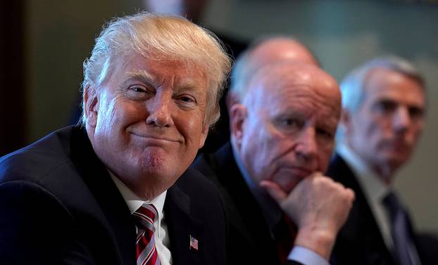 FILE PHOTO: U.S. President Donald Trump holds a meeting on trade with members of Congress at the White House in Washington