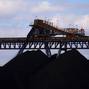 FILE PHOTO: Coal is unloaded onto large piles at the Ulan Coal mines near the central New South Wales rural town of Mudgee, Australia