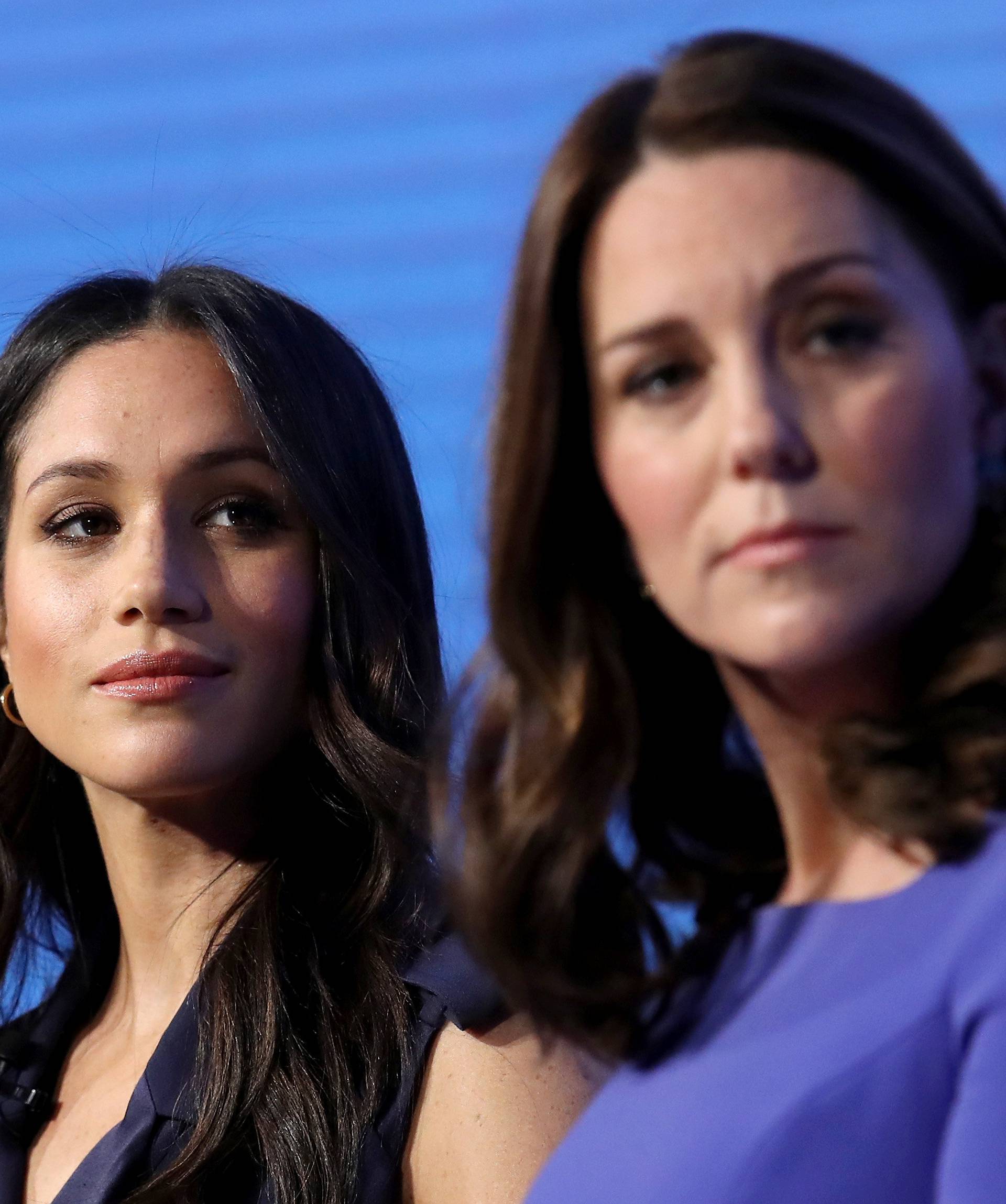 Britain's Catherine, Duchess of Cambridge and Prince Harry's fiancee Meghan Markle attend the first annual Royal Foundation Forum held at Aviva in London