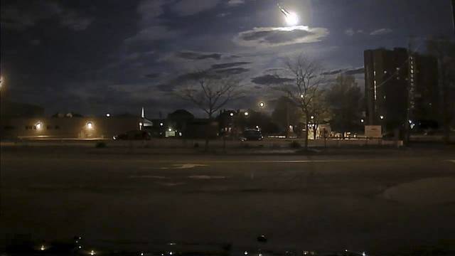 Portland Maine Police Department image of a meteor streaking across the sky early morning in Portland Maine