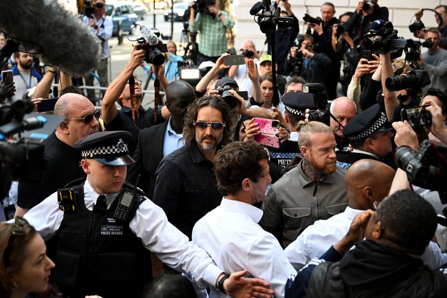 British actor and comedian Russell Brand appears at Westminster Magistrates' Court, in London