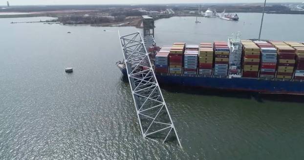 A drone view of the Dali cargo vessel, which crashed into the Francis Scott Key Bridge causing it to collapse, in Baltimore