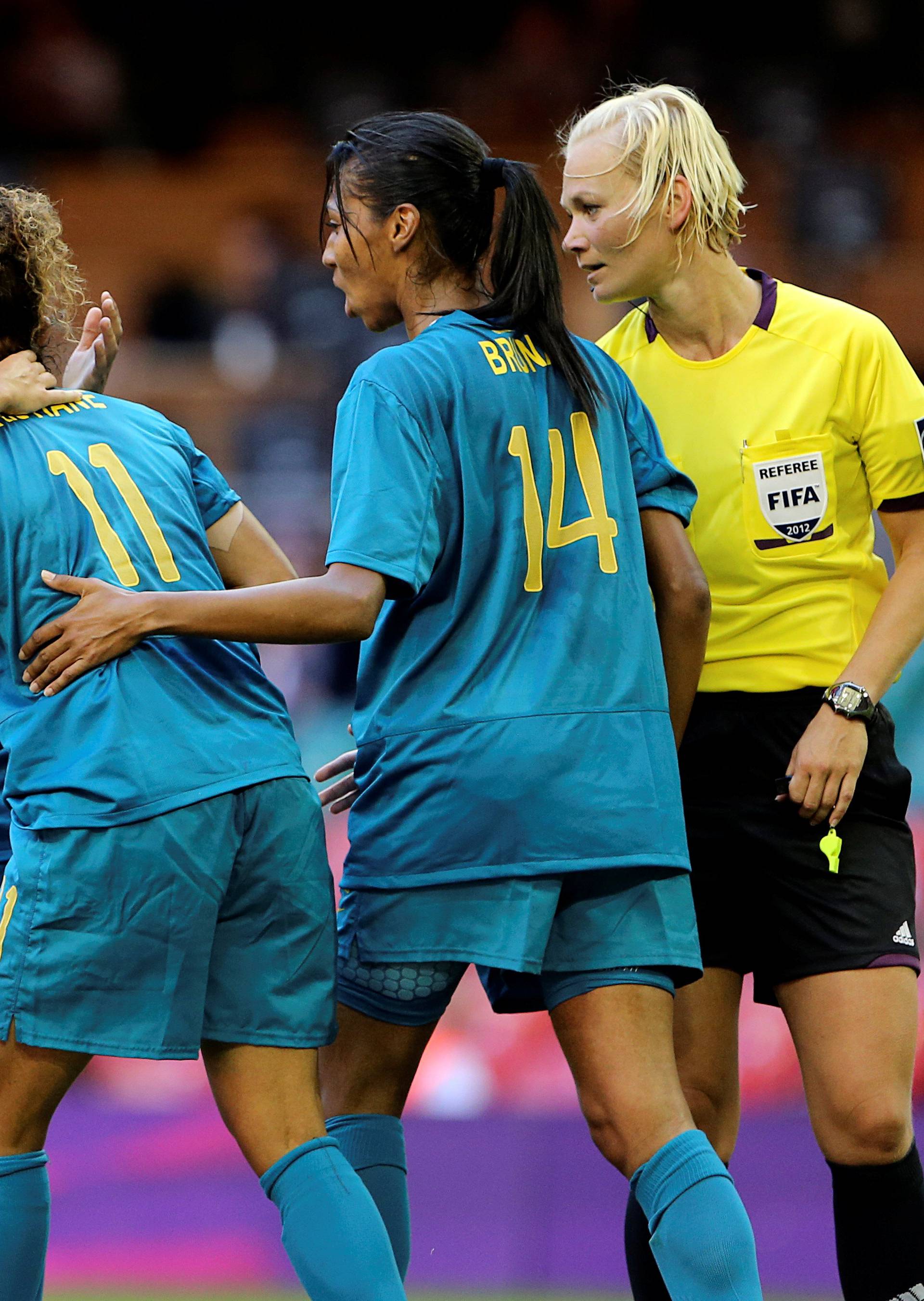 FILE PHOTO: Brazil's Cristiane is congratulated by teammates after scoring a goal during their women's Group E football match against New Zealand at the London 2012 Olympic Games