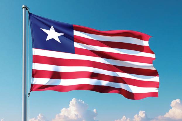 Liberia Flag Waving Against Clear Blue Sky