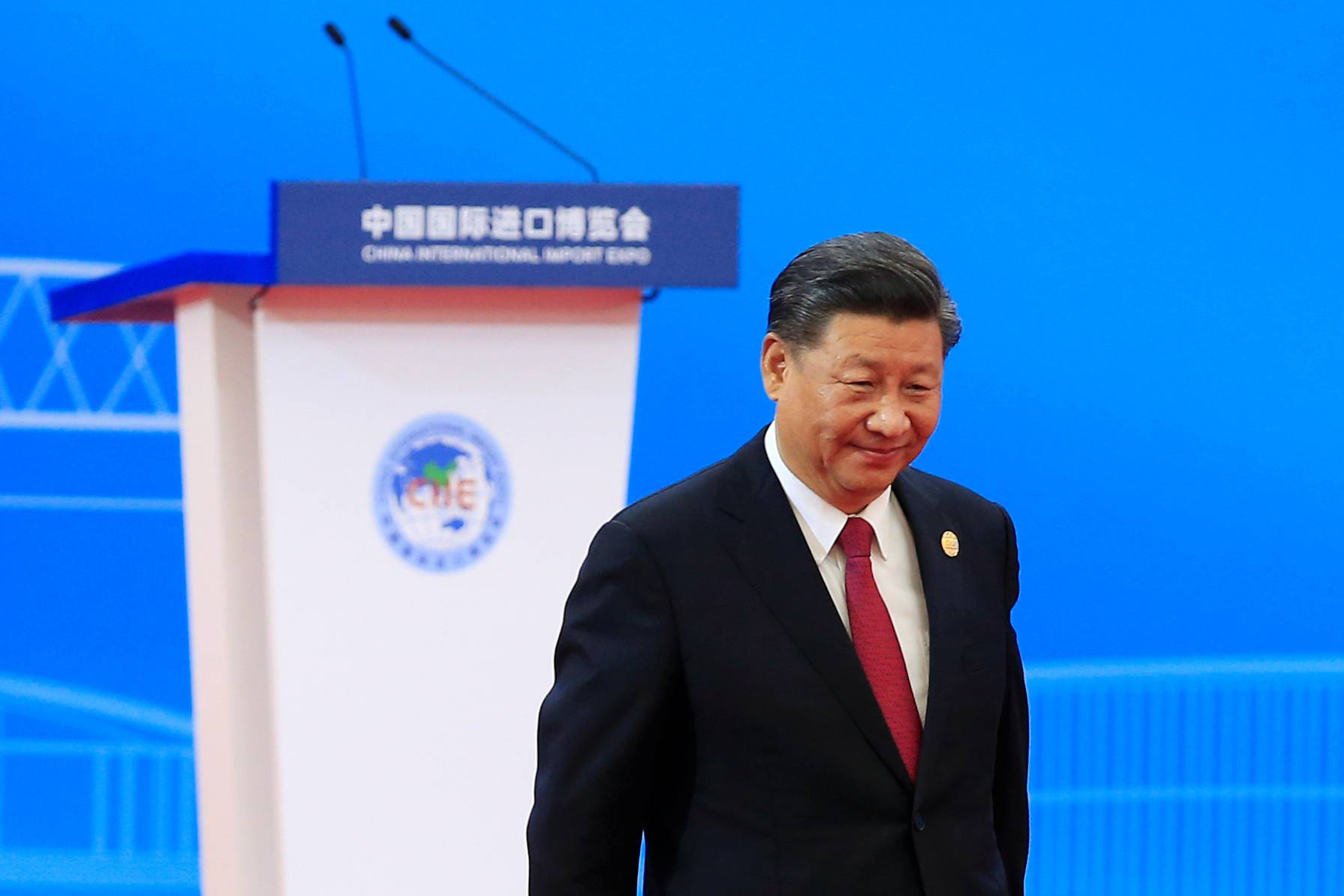 Chinese President Xi Jinping returns to his seat following his speech at the opening ceremony of the second China International Import Expo (CIIE) in Shanghai
