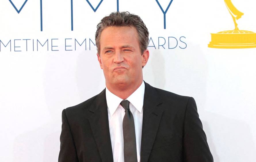 FILE PHOTO: Actor Matthew Perry arrives at the 64th Primetime Emmy Awards in Los Angeles