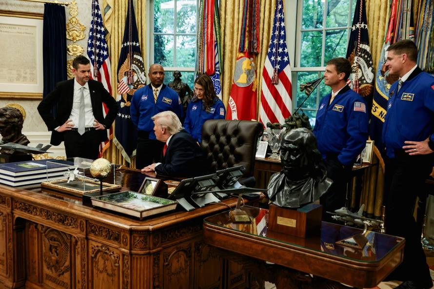 U.S. President Donald Trump meets Artemis II astronauts in the Oval Office at the White House in Washington