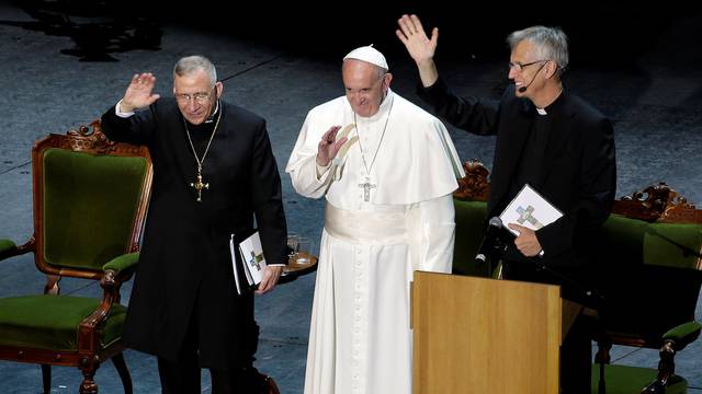 Pope Francis waves with General Secretary of the Lutheran World Federation Rev. Jungeand President of the Lutheran World Federation Bishop Younan at the Malmo Arena in Malmo