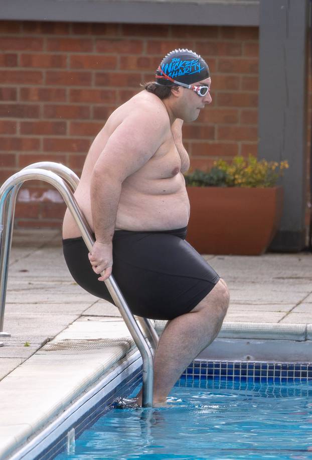 EXCLUSIVE: James Argent makes the most of the good weather with an outdoor swim at his local Lido