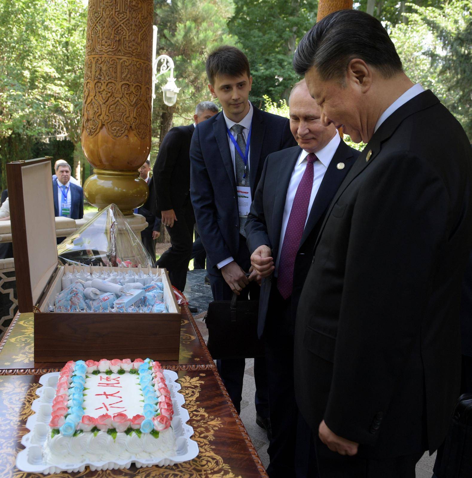 Russian President Vladimir Putin meets with Chinese President Xi Jinping before CICA summit in Dushanbe