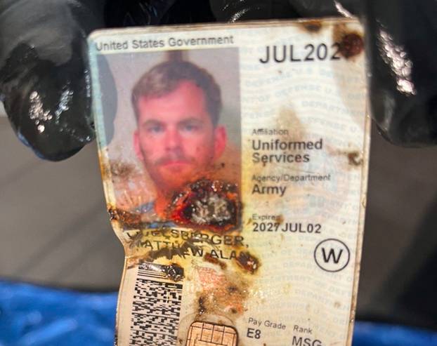 A damaged U.S. government ID of Matthew Livelsberger, driver of the Tesla Cybertruck that exploded outside the Trump International Hotel