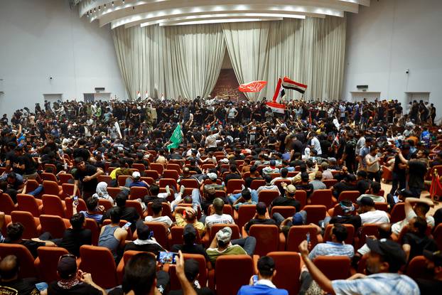 Supporters of Iraqi Shi'ite cleric Moqtada al-Sadr protest against corruption, in Baghdad