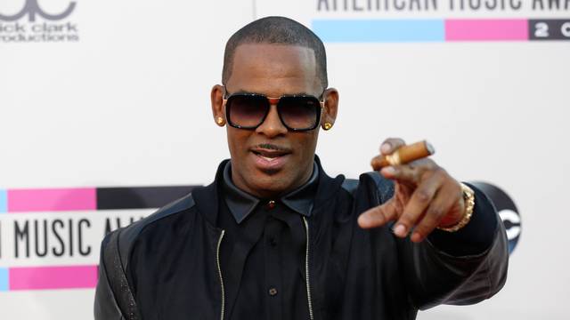 FILE PHOTO: Singer R. Kelly arrives at the 41st American Music Awards in Los Angeles
