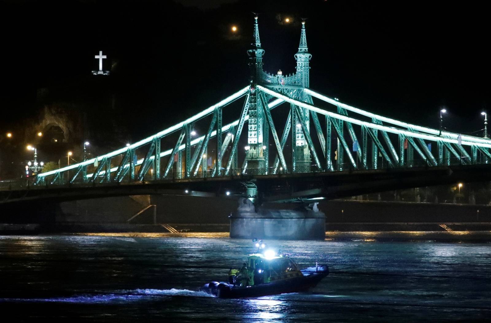 A rescue boat is seen on the Danube river after a tourist boat capsizedÂ in Budapest