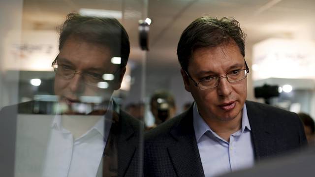 Prime Minister and leader of the Serbian Progressive Party Vucic arrives to cast his ballot in Belgrade