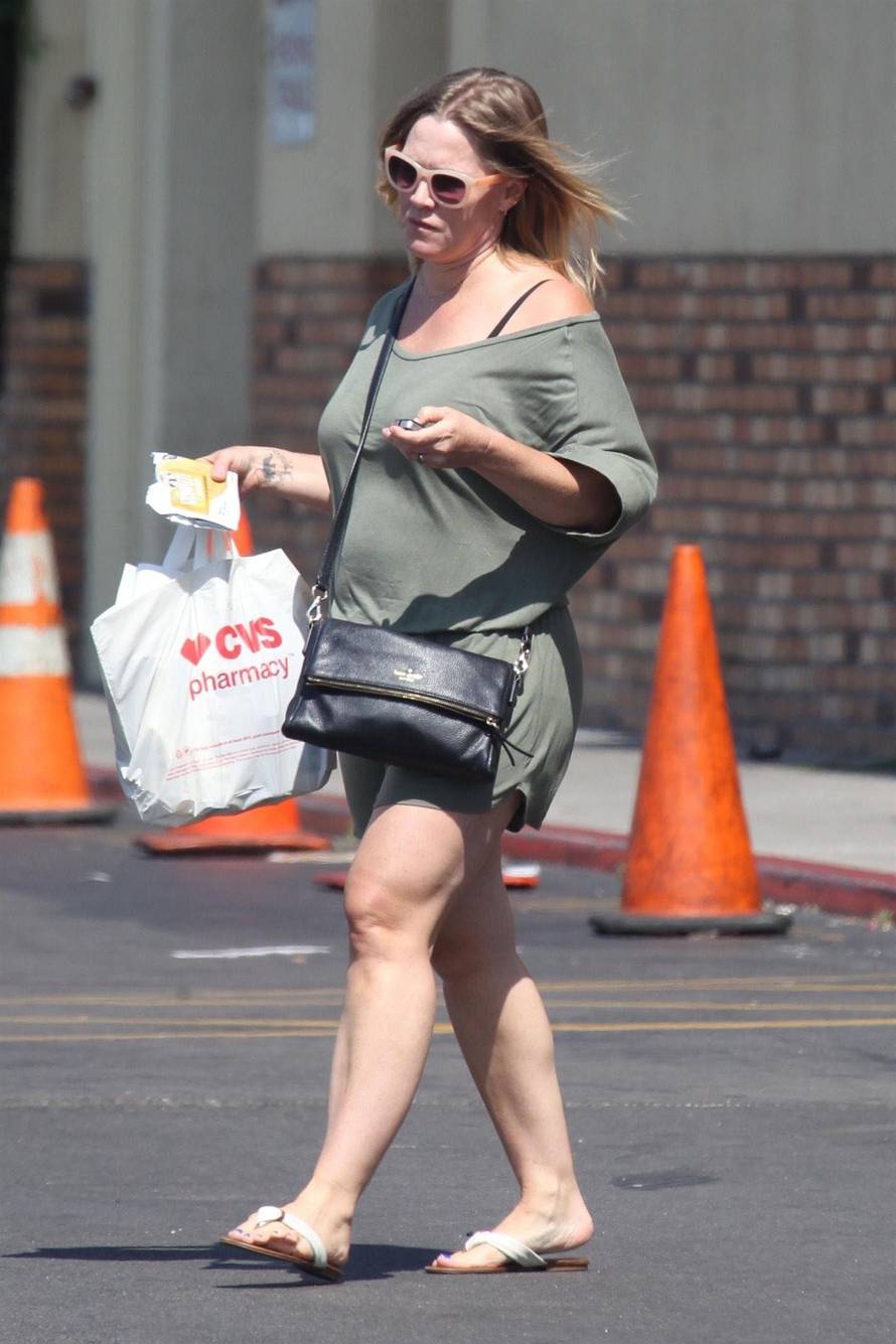*EXCLUSIVE* Jennie Garth can't wait to eat a cookie as she leaves a CVS Pharmacy