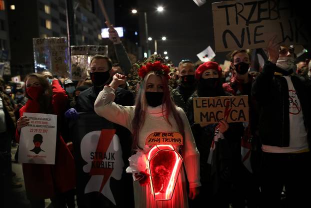 Women take part in a protest in Warsaw