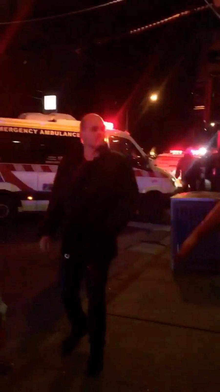 An ambulance is seen following a shooting incident outside a nightclub, in Prahran, Melbourne, Australia in this still frame taken from social media video