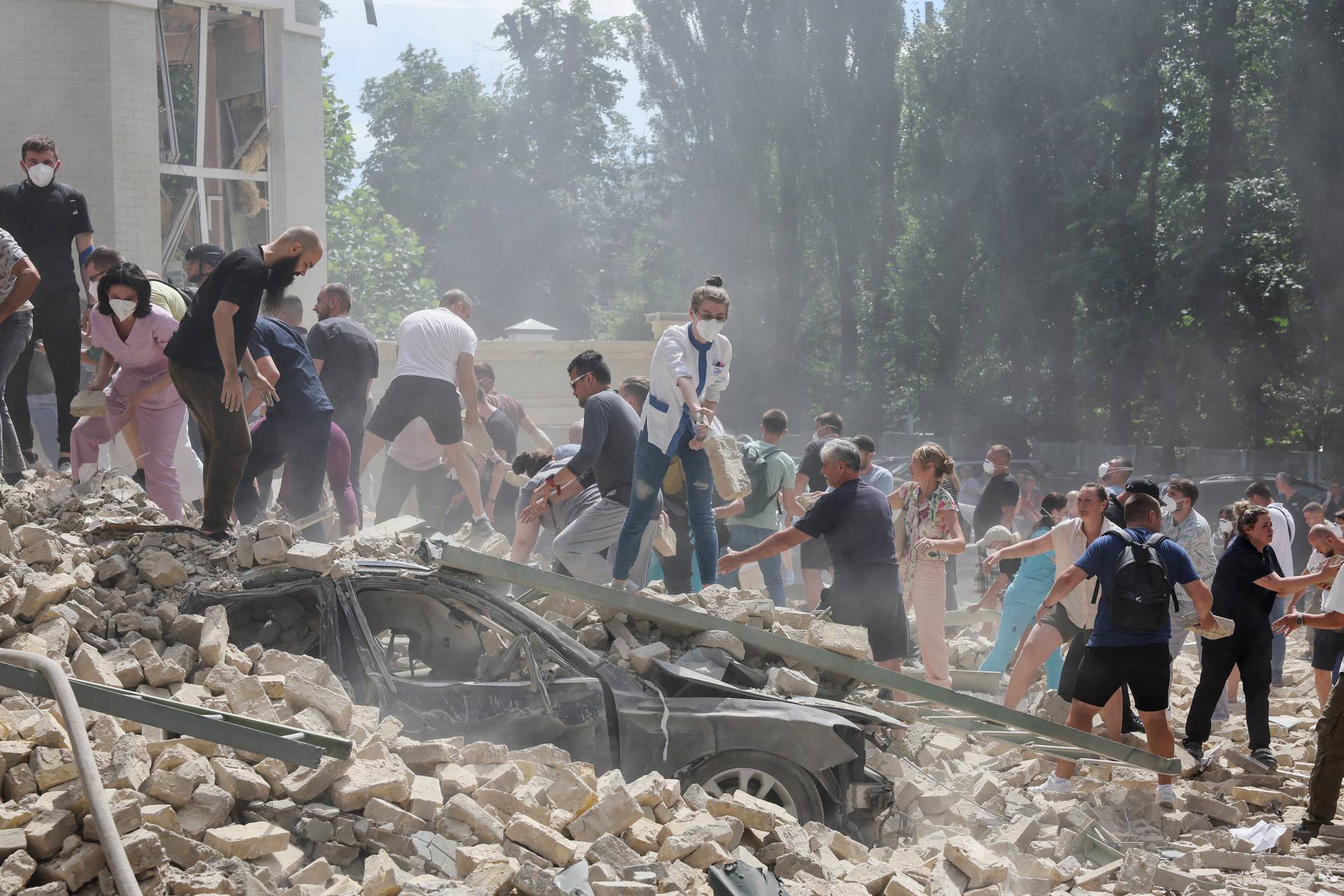 Rescuers work at Ohmatdyt Children's Hospital that was damaged during a Russian missile strikes, in Kyiv