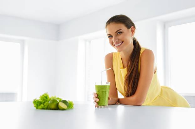 Healthy Meal. Woman Drinking Detox Smoothie. Lifestyle, Food. Dr