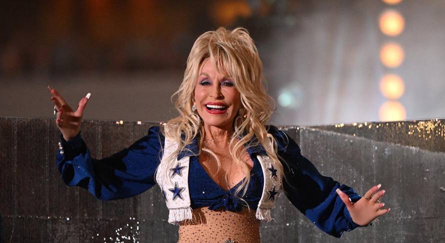 Dolly Parton performs at the Red Kettle Kickoff on Thanksgiving