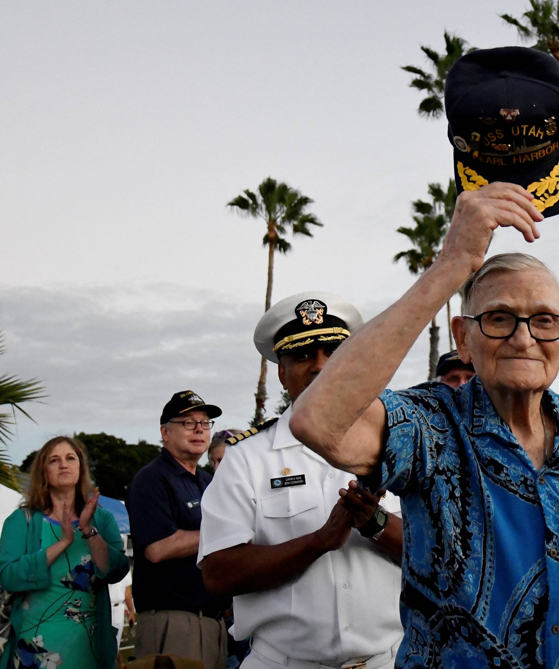 Pearl Harbor survivor Bill Hughes, who was aboard the USS Utah when it was attacked, arrives at a ceremony honoring the sailors of the USS Utah at the memorial on Ford Island at Pearl Harbor in Honolulu, Hawaii