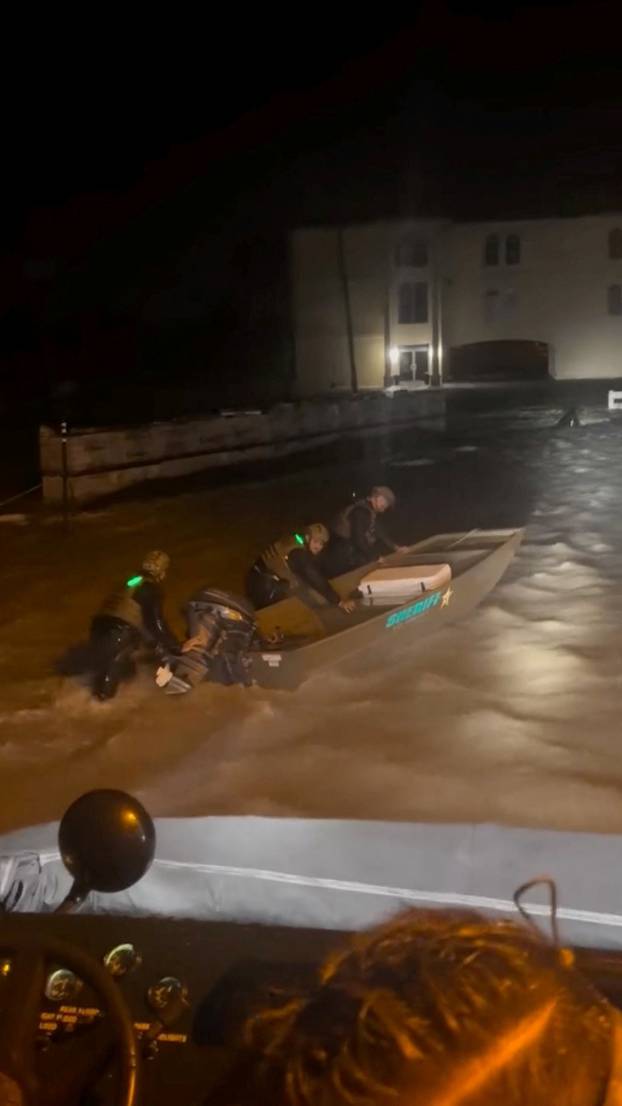 Marine deputies prepare for a rescue along Fort Myers Beach