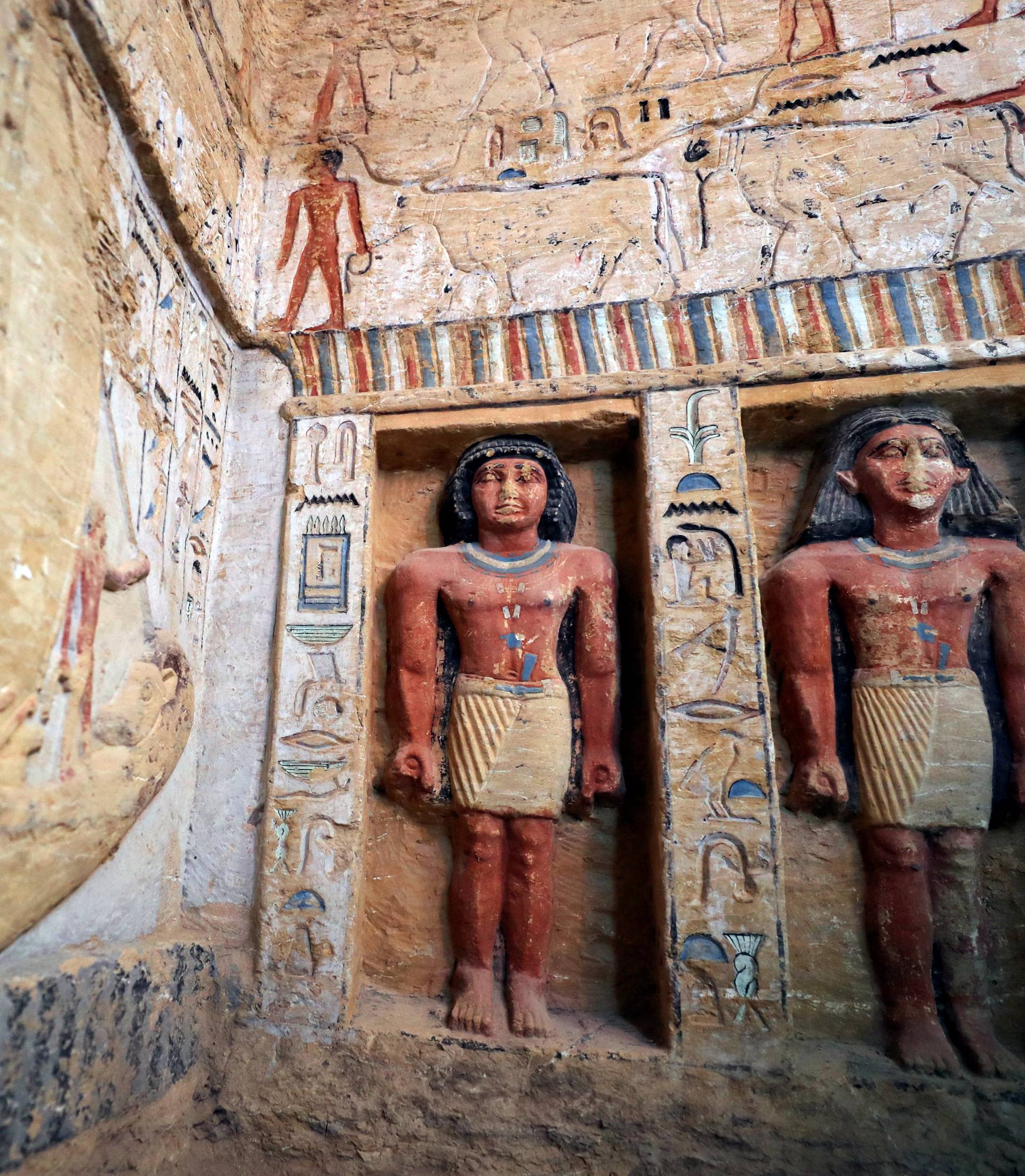 Statues are seen inside the newly-discovered tomb of 'Wahtye', which dates from the rule of King Neferirkare Kakai, at the Saqqara area near its necropolis, in Giza