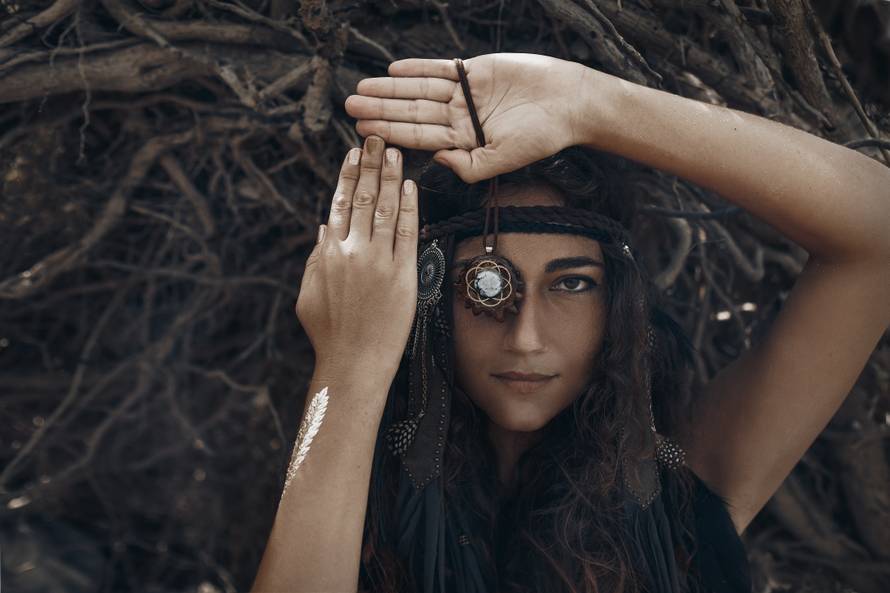 mystery woman close up portrait with roots background
