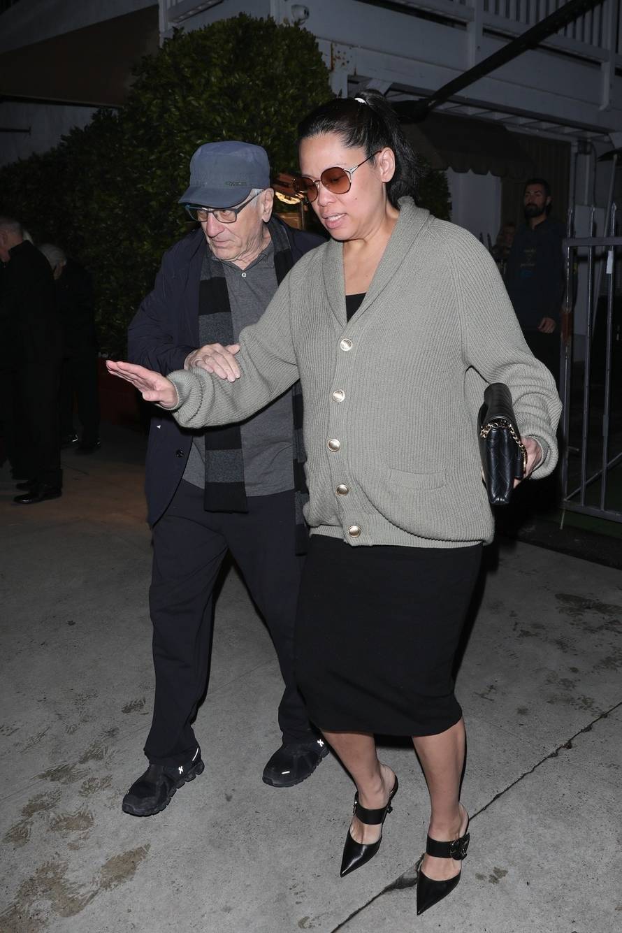 Robert De Niro is a father again at 79! Actor is seen with girlfriend Tiffany Chen on March 22nd where she hid her bump beneath a cardigan sweter. **FILE PHOTOS**