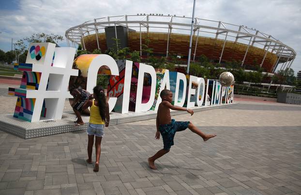 Children play soccer at the Olympic park which was used for the Rio 2016 Olympic Games, in Rio de Janeiro