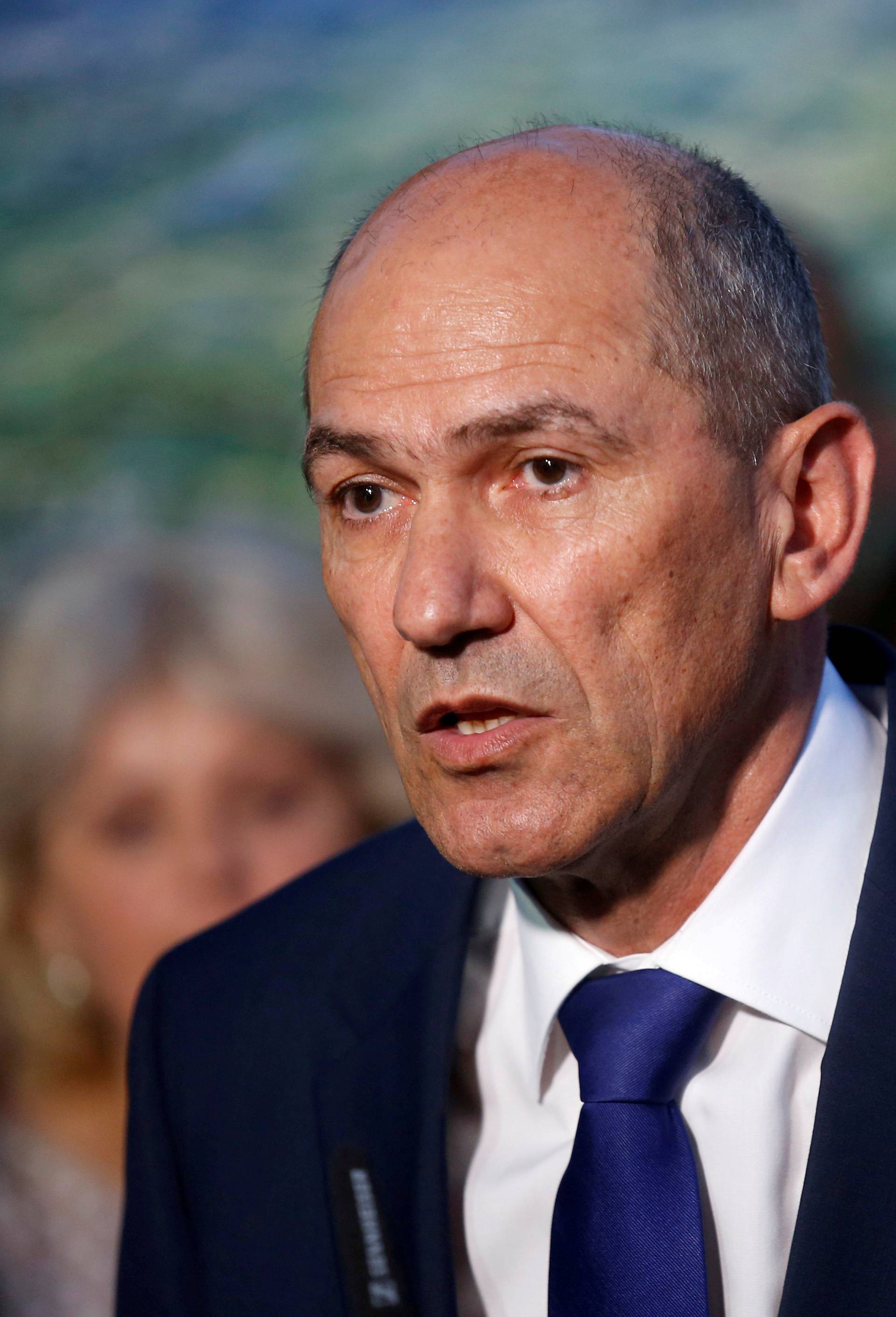 FILE PHOTO: Janez Jansa, leader of the Slovenian Democratic Party (SDS), speaks to the media and supporters after the general election in Ljubljana