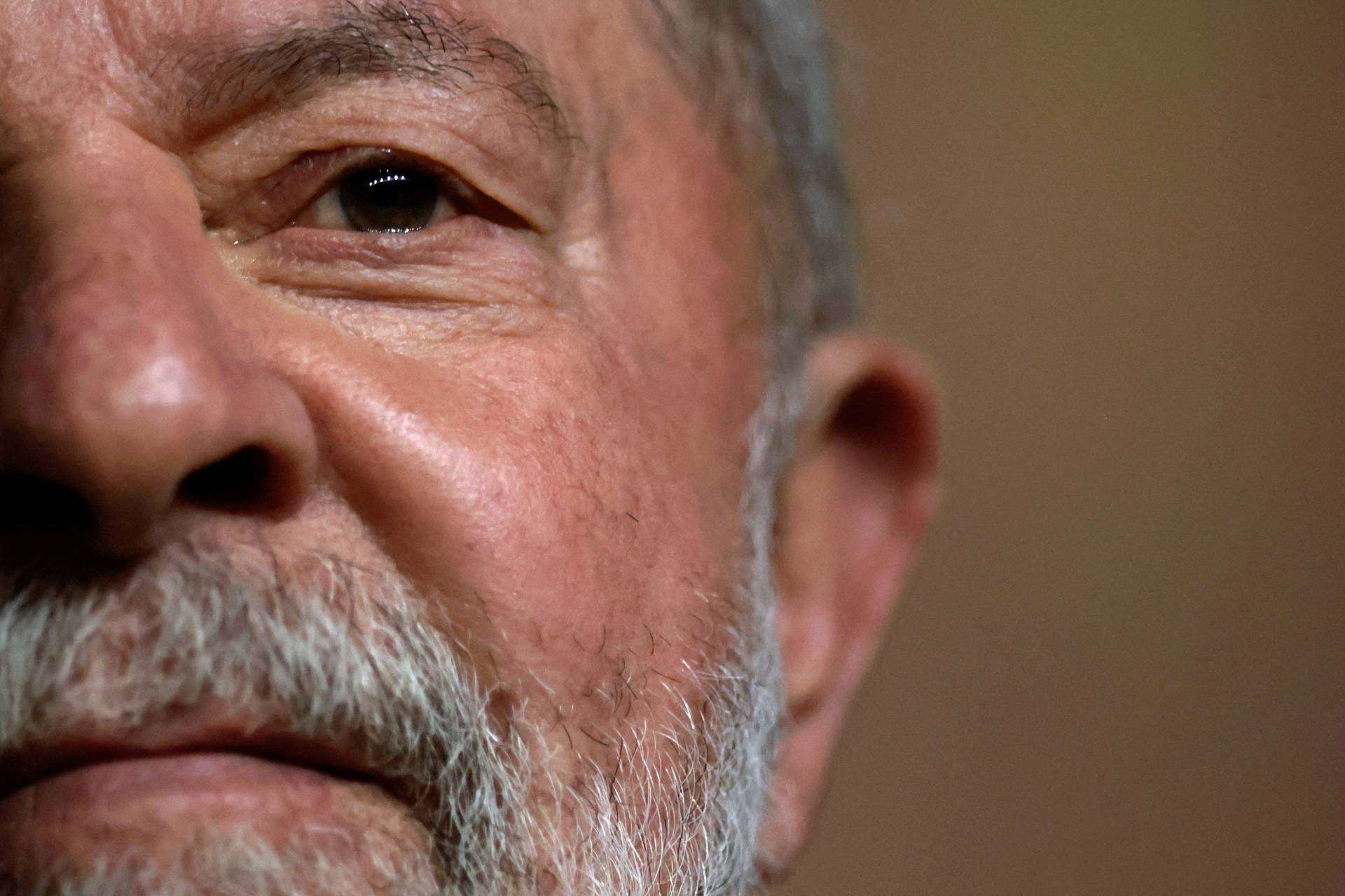 FILE PHOTO: Brazil's former president and presidential frontrunner Luiz Inacio Lula da Silva looks on during a meeting of the Brazilian Socialist Party (PSB), that officially nominated him as candidate of the party, in Brasilia