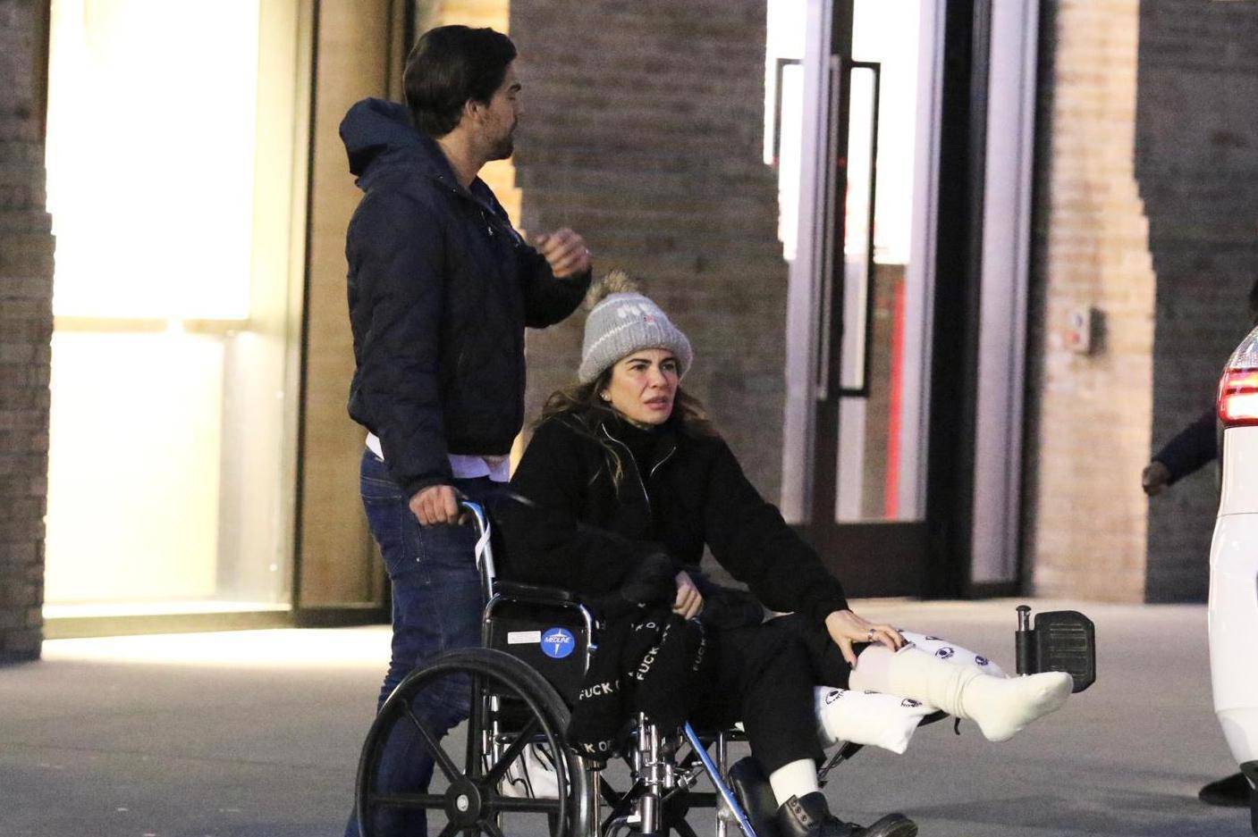 *EXCLUSIVE* Mick Jagger's ex Luciana Gimenez is seen for the first time in a wheelchair after fracturing her leg in a horror skiing accident in Aspen