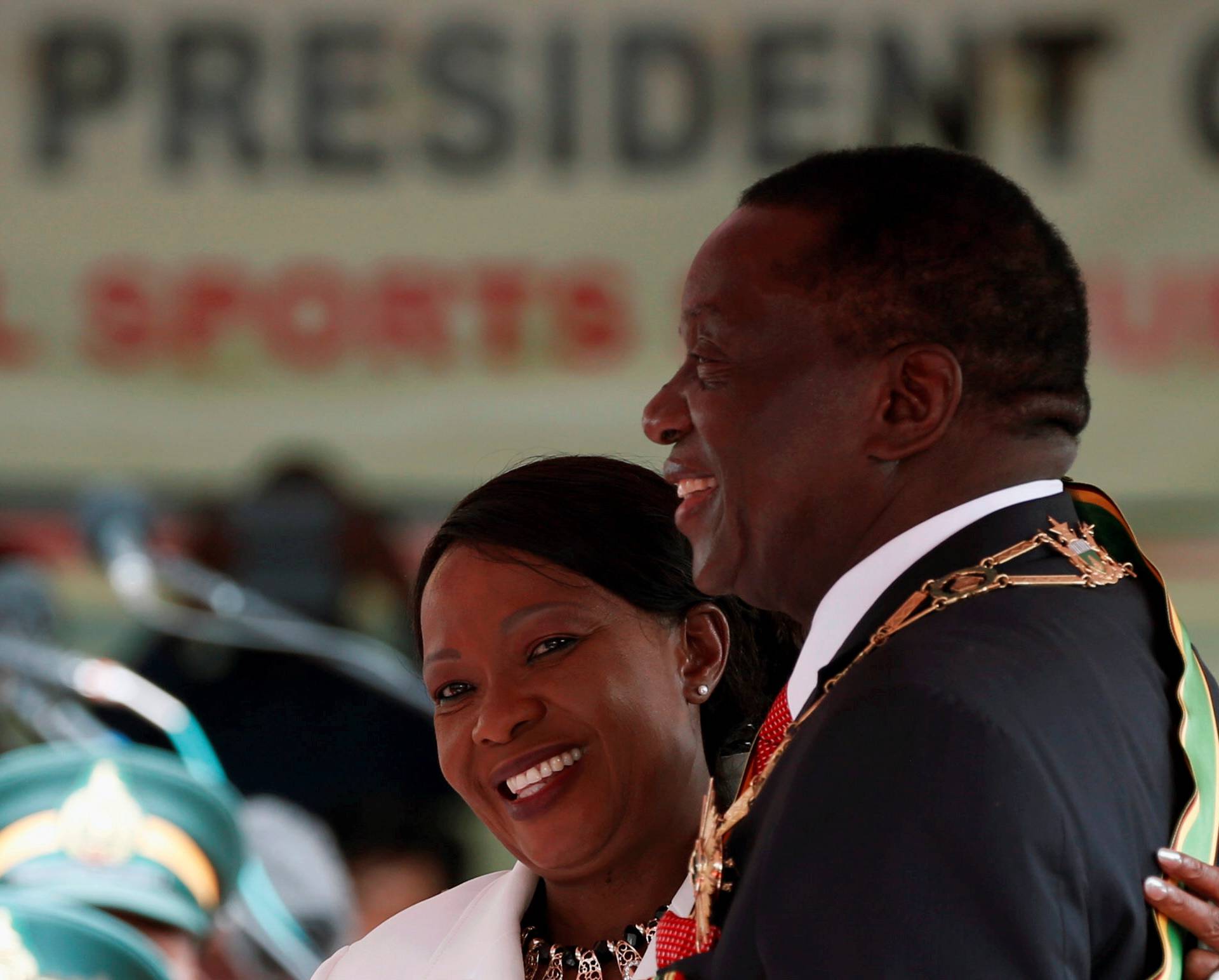 Emmerson Mnangagwa and his wife Auxilia smile after he was sworn in as Zimbabwe's president in Harare