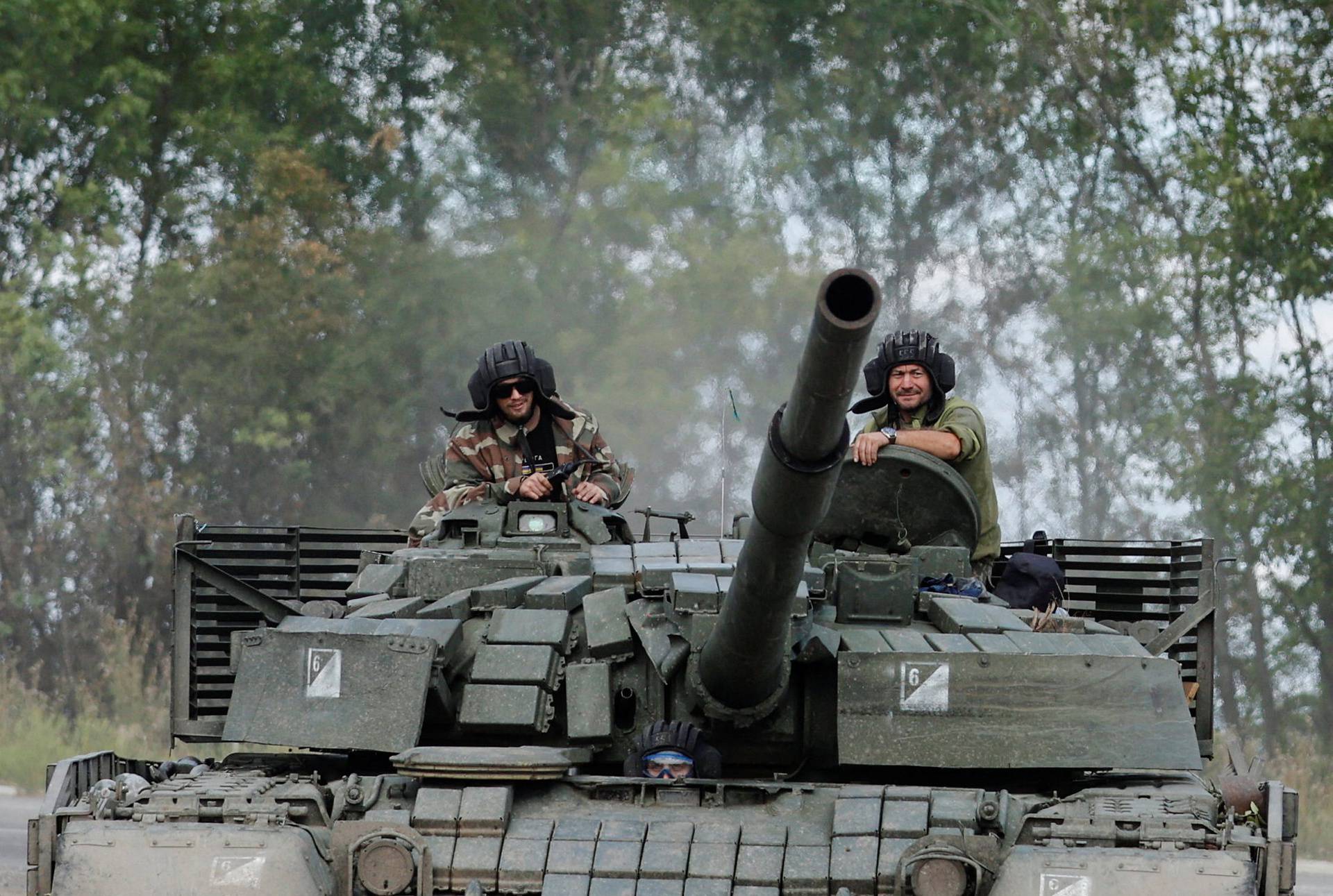 Ukrainian servicemen drive near Bakhmut, Donetsk region