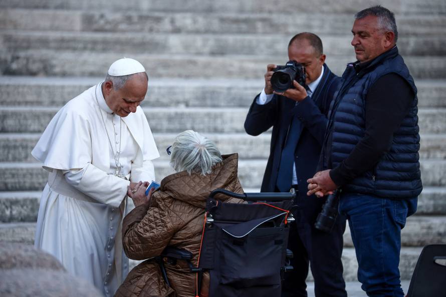 Pope Leo XIV greets the faithful ahead of a Holy Mass presided over by Metropolitan Archbishop of Zagreb Drazen Kutlesa, at the Vatican