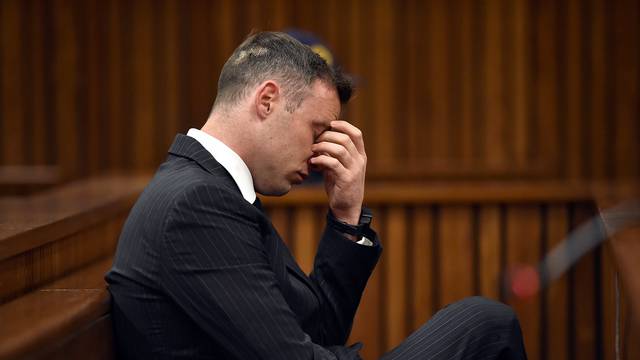 Former Paralympian Oscar Pistorius attends his sentencing for the murder of Reeva Steenkamp at the Pretoria High Court