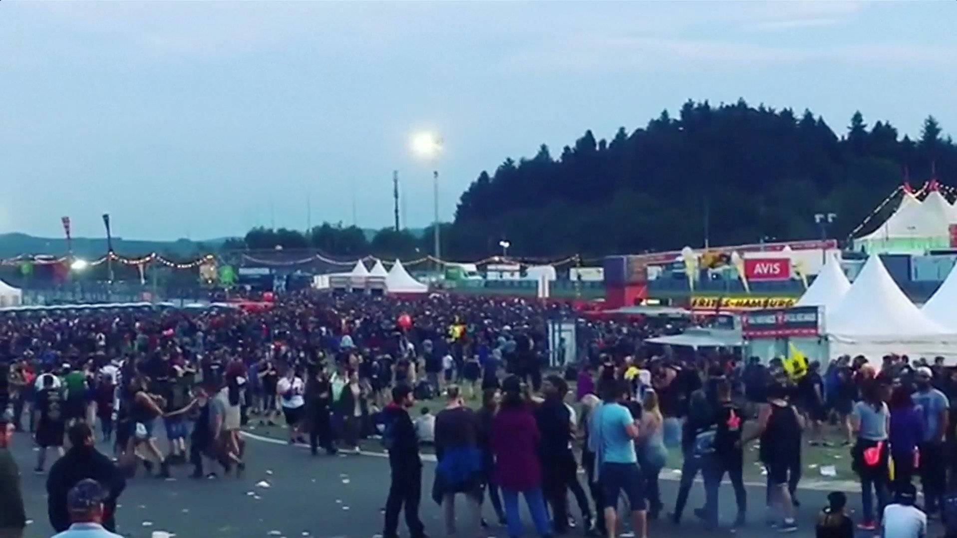 Video grab of people leaving the open-air weekend "Rock am Ring" concert near the Nuerburgring race track in Nurburg, Germany