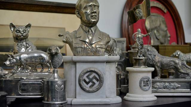A bust of dictator Adolf Hitler among other Nazi artifacts seized in the house of an art collector is on display in this undated Handout photograph, in Buenos Aires