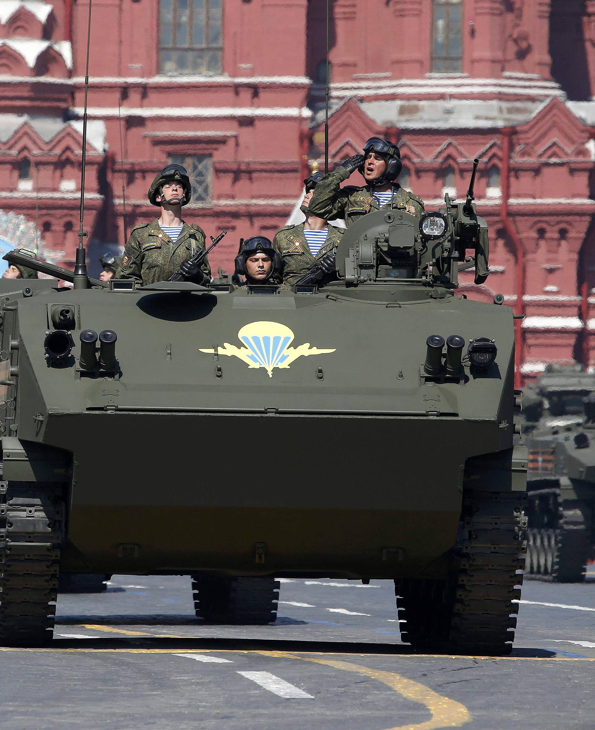 Russian servicemen stand atop military vehicles during the Victory Day parade, marking the 71st anniversary of the victory over Nazi Germany in World War Two, at Red Square in Moscow