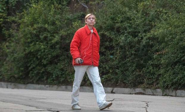Exclusive - Brad Pitt's Rumored New Flame, and Neighbor, Lykke Li, Steps out in Bold Red Jacket as she takes a stroll just a block away from his Los Feliz Estate, Los Angeles, California, USA - 26 Jan 2022