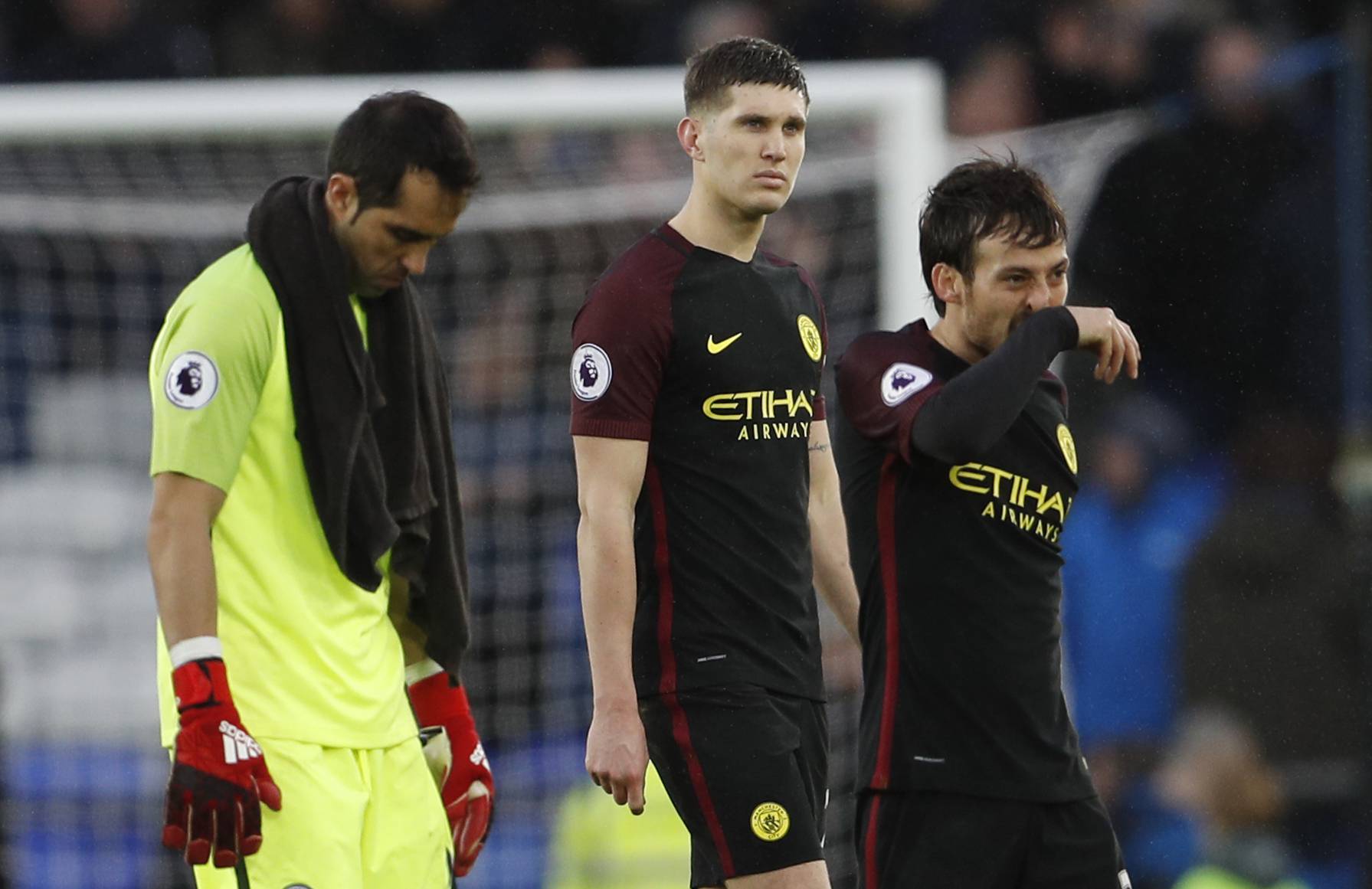 Manchester City's Claudio Bravo, John Stones and David Silva look dejected after the game