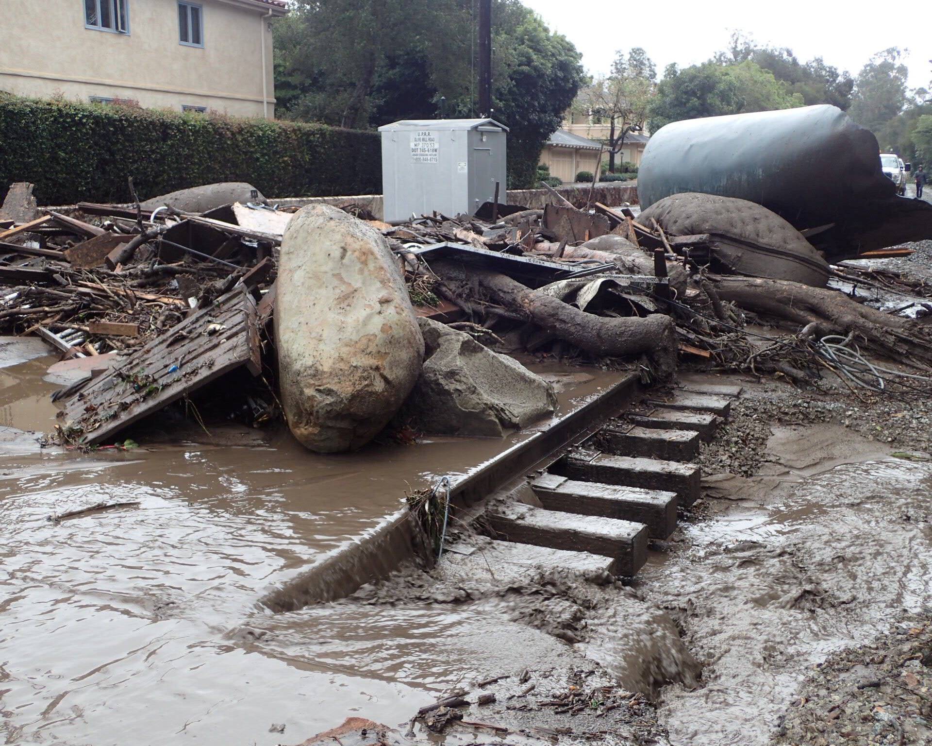 A section of the Union Pacific Railroad is blocked by mudflow and debris after a mudslide in Montecito