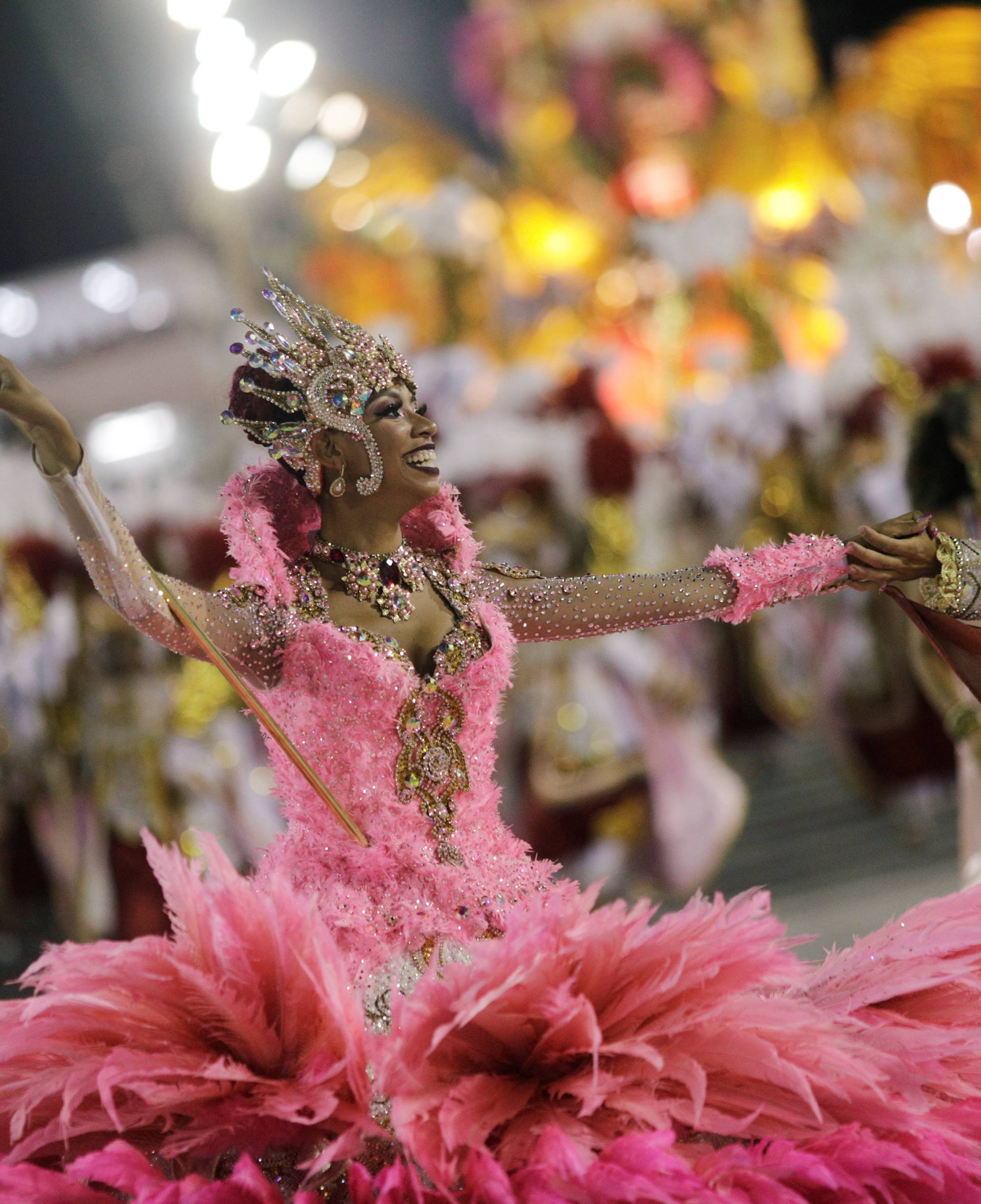 Revellers from Uniao da Ilha Samba school perform during the second night of the Carnival parade at the Sambadrome in Rio de Janeiro