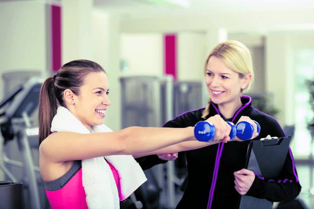 Smiling Woman Using Weights Supervised by Trainer