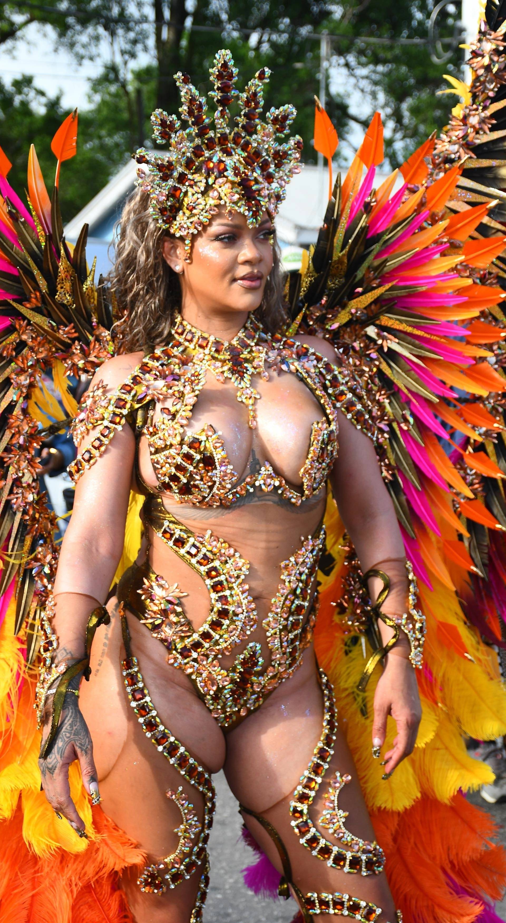 *EXCLUSIVE* Rihanna Dazzles in Bejeweled, Curve-Baring Carnival Costume