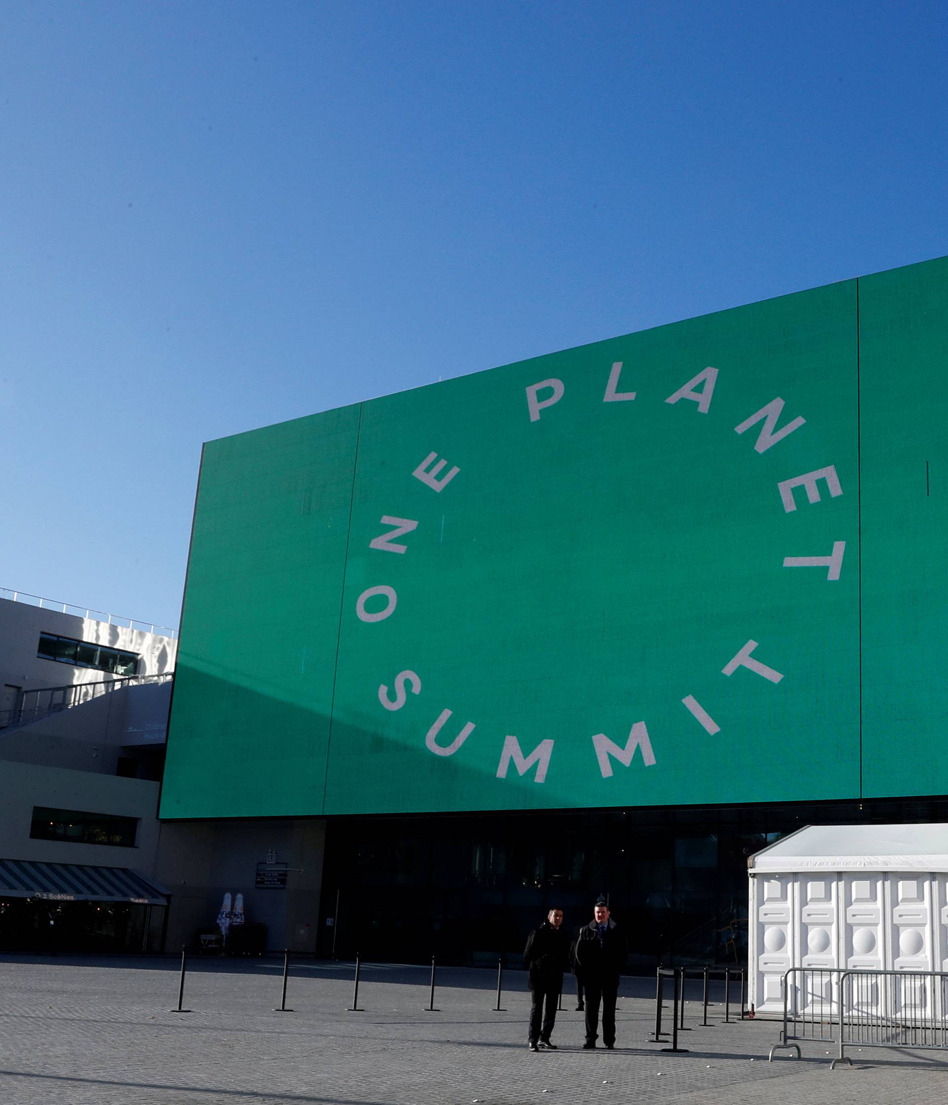 The logo of the One Planet Summit is seen at the main entrance of the Seine Musicale center in Boulogne-Billancourt, near Paris