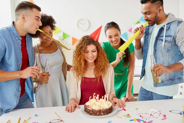 Happy Coworkers with Cake at Office Birthday Party